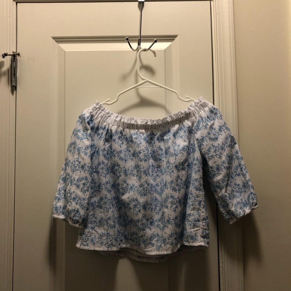 White and blue floral shirt